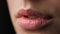 Macro of perfect natural female lips on black background. Plump sexy full lips.