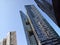 Macro photo with decorative background of perspective of high-rise modern buildings made of glass and concrete in a European city