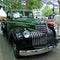 Macro photo with decorative background of retro cars during the exhibition of ancient technology in the European city