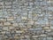 Macro photo with a decorative background of a stone wall in gray shades of color