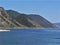 Macro photo with a decorative landscape background of a beautiful perspective of the coastline of lake Baikal in Russia