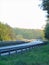 Macro photo with decorative landscape background of the evening sky with the prospect of a highway in a European city in Germany