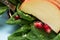 Macro photo. Drops of honey in a fruit plate. Spinach Fruit Salad with pomegr