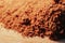 Macro photo of finely ground brown cinnamon