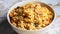 macro photo of pilaf in a bowl on a servery table made of white marble