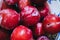 Macro photo, plums in a white ceramic plate with a pattern.