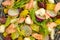 Macro photo of salad with salmon, radish, zucchini and beetroot