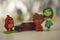 Macro photo of small figures of children`s toys boy girls cars and birds