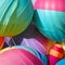A macro photograph of a cluster of colorful balloons, capturing their vibrant shapes and textures2, Generative AI