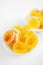 Macro photography of jelly-like craft marmalade with orange juice. The sweetness of yellow and orange jelly candies on a