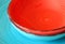 Macro photography of red and blue ceramic plates. graphic design concept. home styling concept. selective focus.