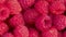 Macro photography of ripe fresh raspberries.  Shooting angle from above.