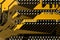 Macro picture of yellow printed circuit board - PCB texture