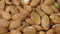 Macro shooting of dry Almond Nuts.Vegetarian food rich in minerals and vitamins. Selective focus