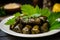 Macro shot of beautifully arranged stuffed grape leaves with tantalizing filling spilling out onto a plate surrounded by vibrant