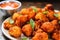 macro shot of buffalo-roasted cauliflower bites