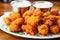 macro shot of buffalo-roasted cauliflower bites