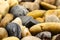 A macro shot of decorative colored pebbles, for use on a background.