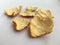 Macro shot of dried tangerine peels on a white background.