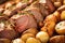 macro shot of garlic cloves on a seasoned lamb roast