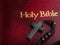 Macro shot. Holy bible and rosary with catholic cross. Holy scripture, religion, faith, prayer, spirituality, forgiveness,