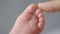 Macro shot of infants toe. Mother touching her small child`s toes while he is asleep. Slow motion Video of mother touching her