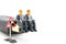 Macro shot on miniature figures as business men working on the laptop notebook sitting on HDMI plug, isolated on white background