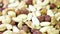 Macro shot of a mixture of nuts. Vegetarian food rich in minerals and vitamins. Peeled nuts. selective focus