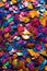 macro shot of multicolored confetti with glittery texture