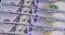 Macro shot of one hundred dollar banknotes