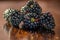 Macro shot of organic , fresh and healthy blackberry , blackberries on a wooden brown background