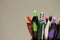 Macro shot of pens and pencils in an office setting