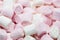 Macro shot of pink and white marshmallows