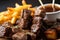 Macro shot of a platter of juicy Churrasco skewers with a side of crispy yucca fries and spicy dipping sauce