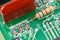 Macro shot of printed circuit board (PCB) with resistors, diodes