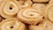 Macro shot of rotation of buttery cookies. Home made with sugar.