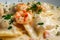 Macro shot of a single ravioli pasta stuffed with lobster and shrimp in a creamy sauce garnished with parsley