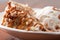 Macro shot of a slice of maple walnut cinnamon cake