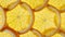 Macro Shot of Sliced Orange Fruit Slices and Rotate. Orange Fruit Pattern. Healthy Food Background. Slow Motion.