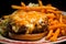 Macro shot of a spicy jalapeno and cheddar stuffed hamburger steak with a side of coleslaw and sweet potato fries