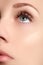 Macro shot of woman\'s beautiful eye with extremely long eyelashes. view, sensual look. Female eye with long eyelashes