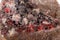 Macro stone Cinnabar with mineral stibnite on a white background