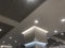 Macro Suspended Grid false ceiling with gypsum bulkhead design and column coves with indirect lighting for a lucrative design view