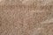 Macro texture beige suede. closeup shammy soft leather background