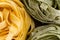 Macro texture of coiled fresh fettuccine pasta