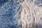 Macro of torn jeans, Denim texture pattern, Close up of ripped threads