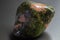 Macro tumbled green and orange Unakite Jasper chalcedony crystal