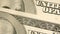 Macro video, Close-up of isolated dollar bills being laid on the table, Portraits of George Washington and Benjamin