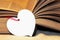 Macro view of book pages. heart made of paper