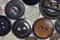 Macro view of buttons and fasteners with assorted colors and textures